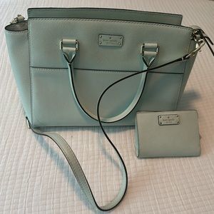 Light green top handle and crossbody Kate spade bag with matching wallet